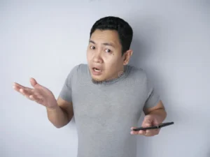 asian man shrug shoulder i don t know gesture photo image funny up showing denial rejection adult attractive casual 159935209 1
