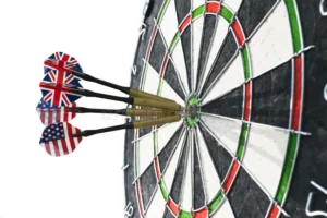 metal darts have hit red bullseye dart board darts game darts arrow target center darts bull s eye close up 109474002
