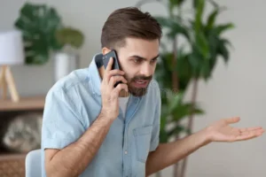 angry man talking smartphone solving work problem talk arguing irritated male have cell phone conversation manage trouble 132436070 1